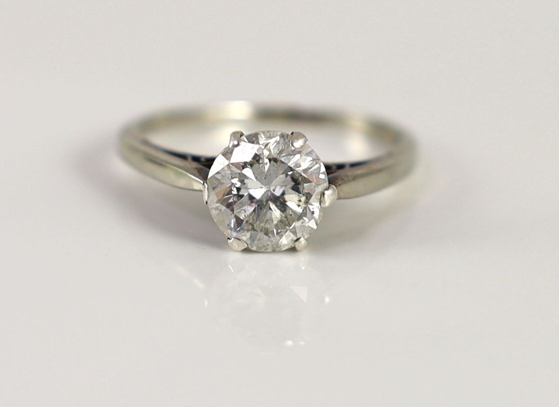 A 9ct white gold and solitaire diamond ring